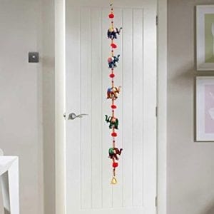 five hand painted elephants stringed together with beads and brass bell