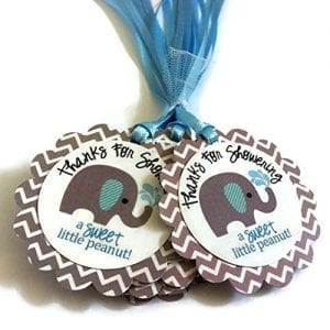 small favor tags with blue ribbons and pictures of elephants